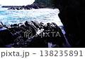 Rough waves crashing on Cape Kamiwari in late autumn spew out spray between the oddly shaped rocks. 138235891