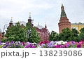 Colorful flowers blooming in foreground with historic Red Square buildings under cloudy sky 138239086