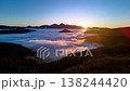 Stunning sunset drone hyperlapse of rolling fog sea over forest valley 138244420
