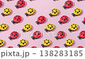 Creative abstract summer ladybug pattern flat lay on pastel pink background minimalism 138283185