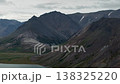 Cinematic Pan across Bering Strait mountain ridge and tundra valley, Chukotka 138325220