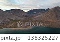 Cinematic pan reveal of Rumilet Bay ridges and distant peaks in Chukotka 138325227