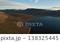 Cinematic travel pan right above Gilmimyul Bay curved coastline Chukotka 138325445