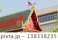 Closeup of ornate Thai temple roof with glass building background 138338235