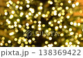 The garland's soft, warm lights create a soft, golden background with a bokeh effect, reminiscent of a festive atmosphere, like New Year's or Christmas celebrations. 138369422
