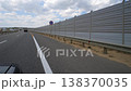 Soundproof fencing along the expressway. Hyperlapse. Shooting in motion. A barrier near an asphalt road. Highway. The highway. 138370035