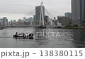 [4K/Tripod Mounted] A flock of seagulls takes flight in surprise at the Chuo Ohashi Bridge and a workboat on the Sumida River (Tokyo Waterfront Scenery) 138380115
