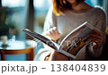 Japanese woman reading a magazine 138404839
