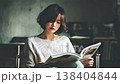 Japanese woman reading a magazine 138404844