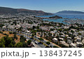 Aerial drone view of Bodrum city in Turkey with marina, yachts and white houses. Scenic Mediterranean coastline with mountains and blue sea in summer. 138437245