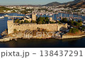 Aerial view of Bodrum Castle on the coast with marina and yachts. Historic fortress surrounded by Mediterranean sea and cityscape in Turkey. 138437291