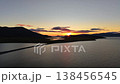 aerial view Pan right to glowing horizon over lagoon in Provideniya Chukotka 138456545