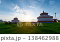 mongolian yurts and cattle under the setting sun on the vast grassland 138462988