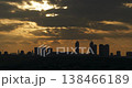 Sunset footage between the city and buildings. Dance of clouds above the buildings. Cloud movements captured with time lapse technique. 138466189