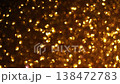 Elegant warm golden bokeh circles and soft shimmering light particles drifting gracefully on a dark black background. 138472783