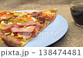 Fresh pizza with tomatoes and olives on a plate 138474481