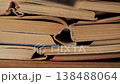 Stack of old books close up with worn pages and vintage texture 138488064