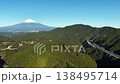 Fixed-camera drone footage offering an aerial view of the highway near Shin-Shimizu Interchange and Mount Fuji (only the cars are moving). 138495714