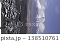 A time-lapse video (vertical, fixed) of the snow-covered town and Mt. Fuji as seen from a hilltop in Yamanakako Village. 138510761