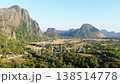 Aerial perspective of majestic limestone karst mountains and tropical jungle with dracaenas and cycas in Vang Vieng, Laos 138514778