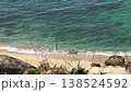 Cliff Top Vista of Turquoise Sea Waves Lapping Sandy Beach Shore 138524592