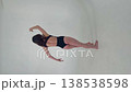 Woman Performing Contemporary Dance in a Studio 138538598