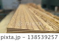 Milling of a wooden model on a CNC machine 138539257