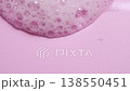 Slow motion close-up soap foam texture on pink background, white shampoo soapsud 138550451