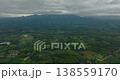 Agricultural land with paddy rice fields and mountain with green forest. Mindanao, Philippines. 138559170