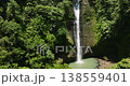 Forest with waterfalls. Alalum Falls with green spherical basin. Mindanao, Philippines. 138559401