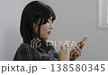 Woman using a smartphone 138580345