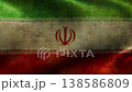 Fluttering flag of Iran with well-worn fabric texture 138586809