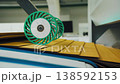 Efficient automated packaging process. Modern factory with precise sheet handling systems. Advanced industrial environment showcasing automated guiding systems for corrugated sheet processing 138592153