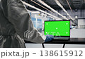 Isolated screen laptop used by technician to monitor microchip production in factory cleanroom. Specialist supervises semiconductors manufacturing with chroma key notebook, camera B close up 138615912