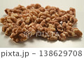A close-up video of walnuts; macro footage of nuts against a white background. 138629708