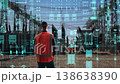 Technical Professional Evaluating Realtime Grid Analytics And Structural Conditions From Back View 138638390