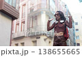 Happy female traveler dancing in the streets of Madrid 138655665