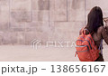 Joyful student woman dancing happily uphill on stairs 138656167