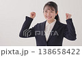 A young lady in a suit A young lady in a suit 138658422