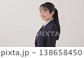 A young lady in a suit A young lady in a suit 138658450