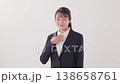 A young lady in a suit A young lady in a suit 138658761