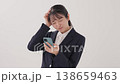 A young lady in a suit A young lady in a suit 138659463