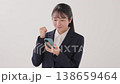 A young lady in a suit A young lady in a suit 138659464