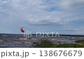 In windy cloudy weather, an extreme sport. Kitesurfing on the Rybinsk Reservoir 138676679