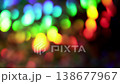 Dynamic vibrant rainbow colorful bokeh spots shimmering on dark black background 138677967