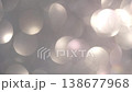 Elegant large soft platinum and silver bokeh circles slowly moving on muted grey background 138677968
