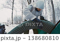 Winter Camping: Setting up Air Mattress in Tent, Forest 138680810