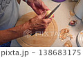 Woman cutting and preparing vegetables at home in the kitchen. Concept for cooking and food preparation. 138683175