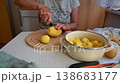 Woman cutting and preparing vegetables at home in the kitchen. Concept for cooking and food preparation. 138683177