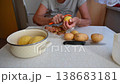 Woman cutting and preparing vegetables at home in the kitchen. Concept for cooking and food preparation. 138683181